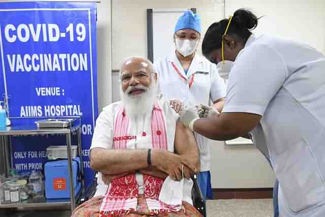 PM Modi receives his vaccination against Covid-19. (Pic Via Twitter)